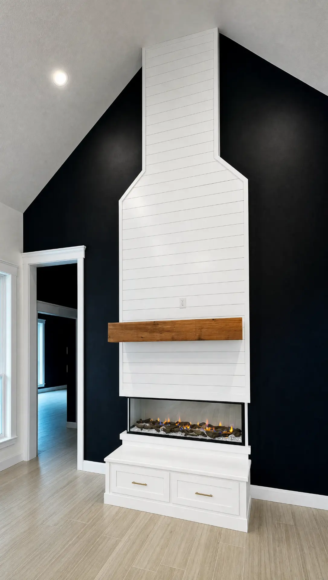 Shiplap fireplace surround with cedar mantel and custom cabinetry finished by Elite Solutions of Texas